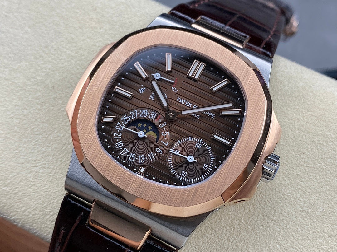 Patek Philippe watch with rose-gold case, black dial, and dark leather strap
