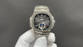 Stainless steel Patek Philippe watch, black dial with blue ring detail