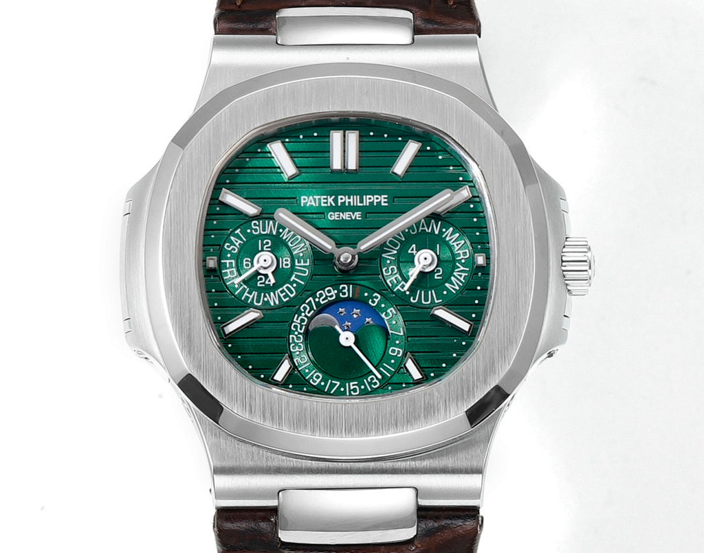 Patek Philippe watch with dark green dial, silver hour markers, and brown strap