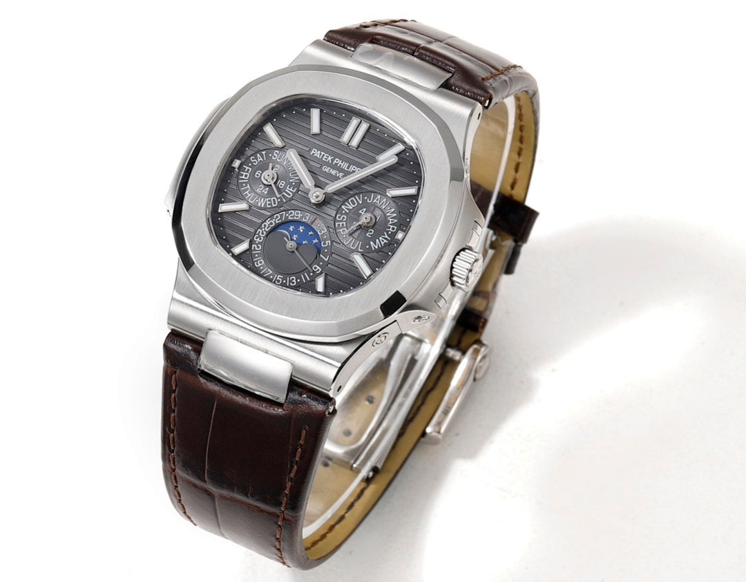 Patek Philippe Nautilus watch three-quarter view with brown leather strap and steel case