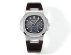 Patek Philippe Nautilus watch front view with dark dial, brown leather strap, and steel case