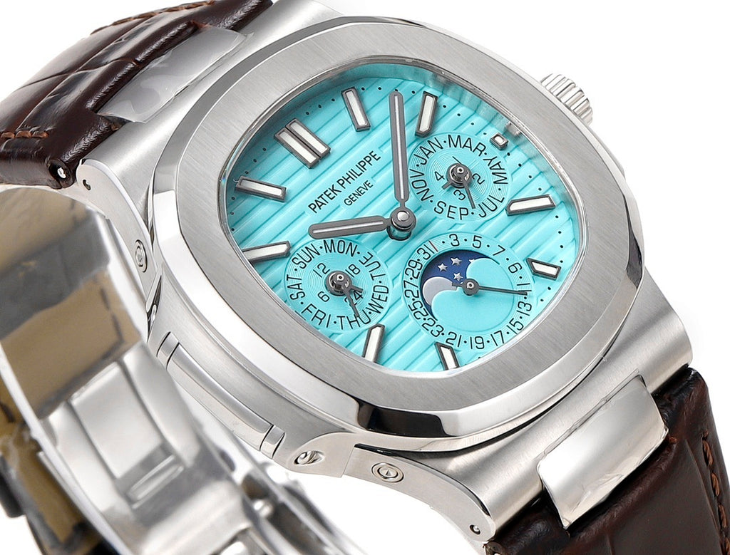 Patek Philippe watch close-up showing turquoise dial, crown, and brown leather strap