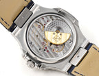 Automatic wristwatch caseback, exposed mechanical movement with gold-toned bridge