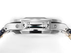 Stainless steel wristwatch side profile with visible crown and polished bezel