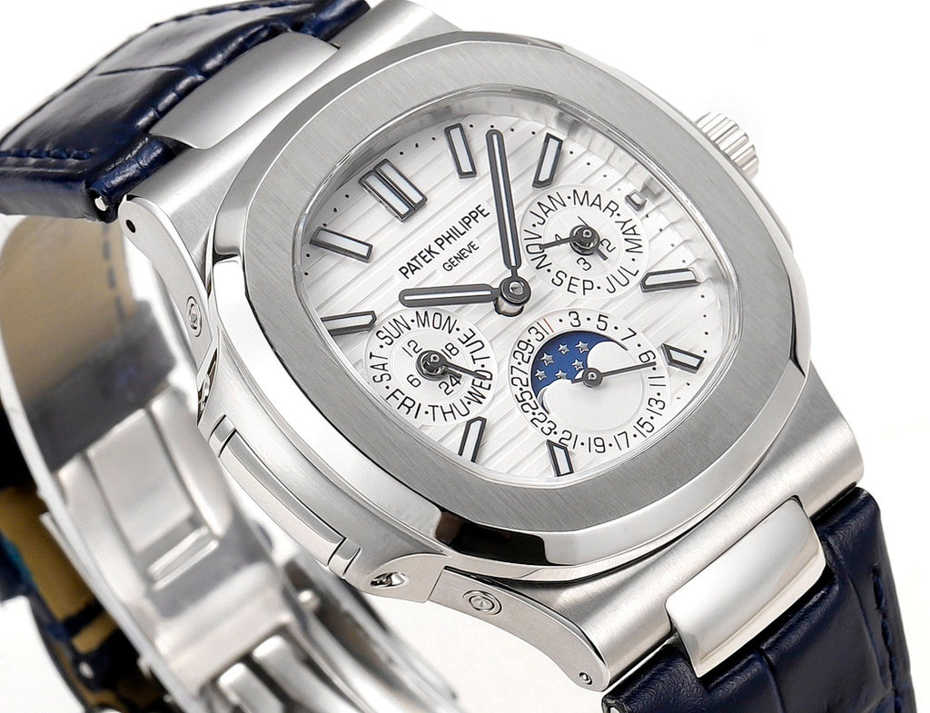 Wristwatch front close-up, silver dial with blue moonphase subdial and minute markers