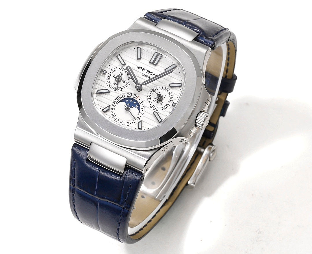Wristwatch in silver case with blue leather strap, silver dial with subdial and track