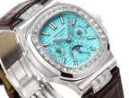 Patek Philippe wristwatch close-up of turquoise dial and diamond bezel, brown strap
