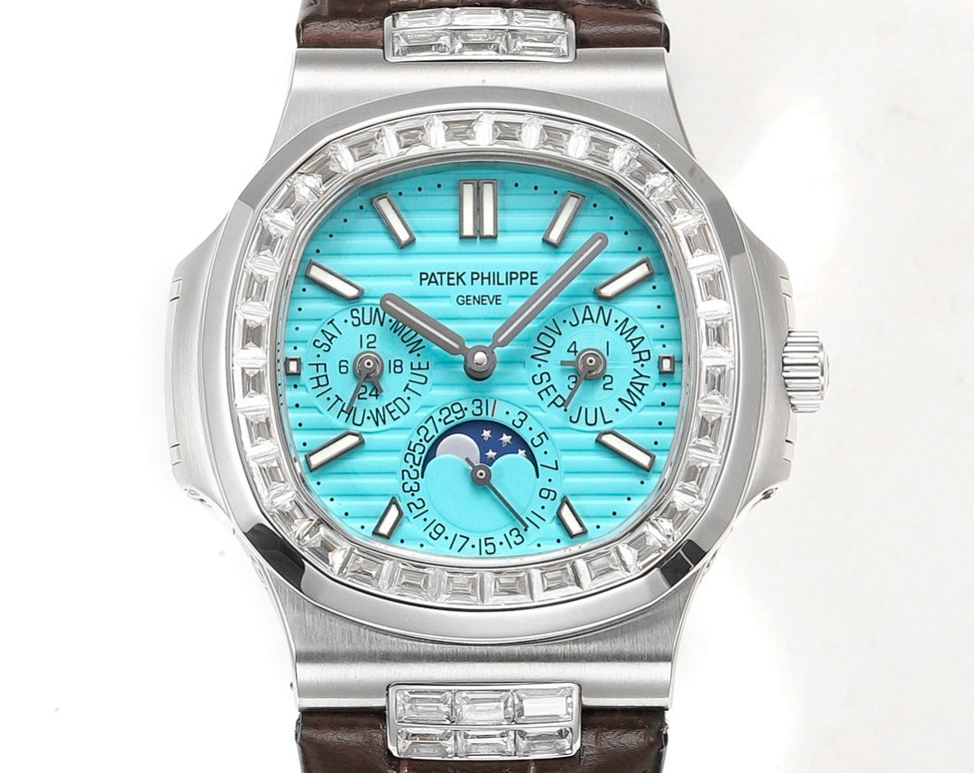 Patek Philippe wristwatch face view with turquoise dial, moonphase subdials, brown strap