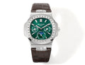 Patek Philippe watch with green dial, silver case, brown leather strap, gem-set bezel.