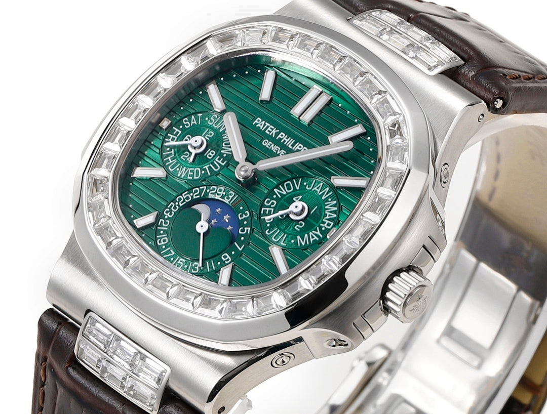 Patek Philippe watch angled view of green dial, silver bezel, and brown leather strap.