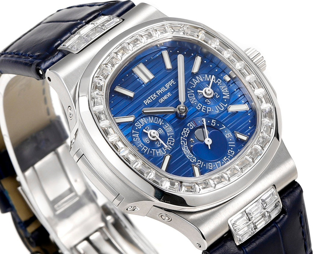 Patek Philippe watch close-up with blue dial and silver bezel with gem markers