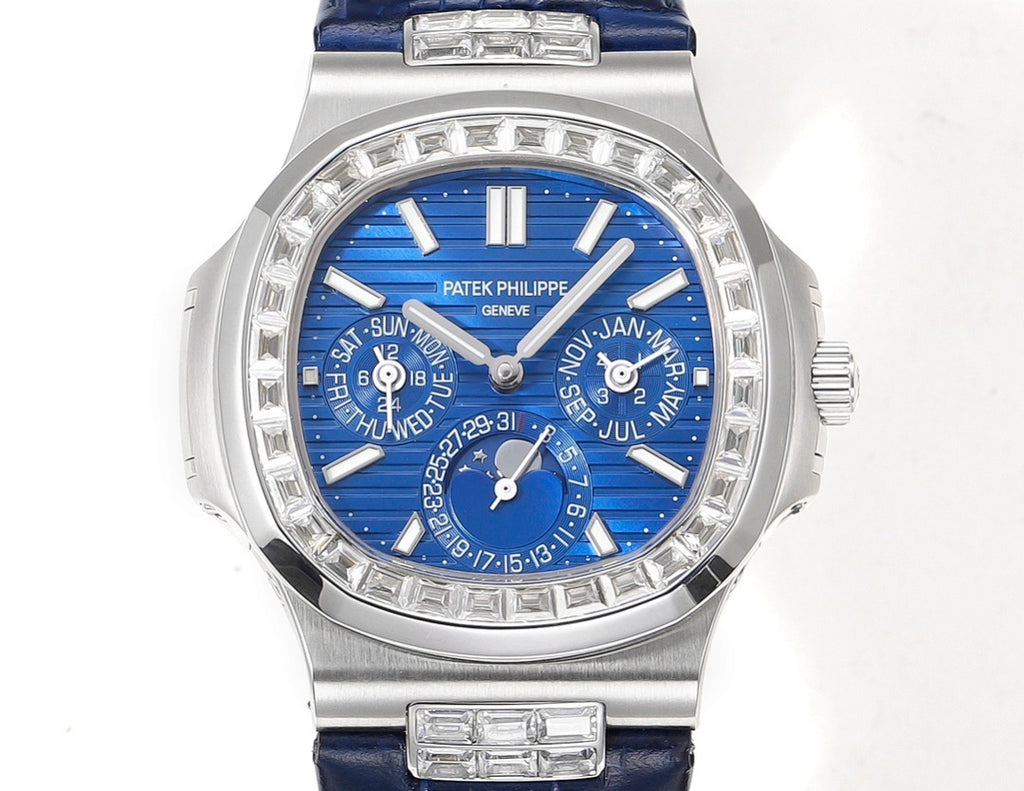 Patek Philippe watch front with blue dial, silver case and diamond bezel on blue strap