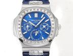 Patek Philippe watch front with blue dial, silver case and diamond bezel on blue strap