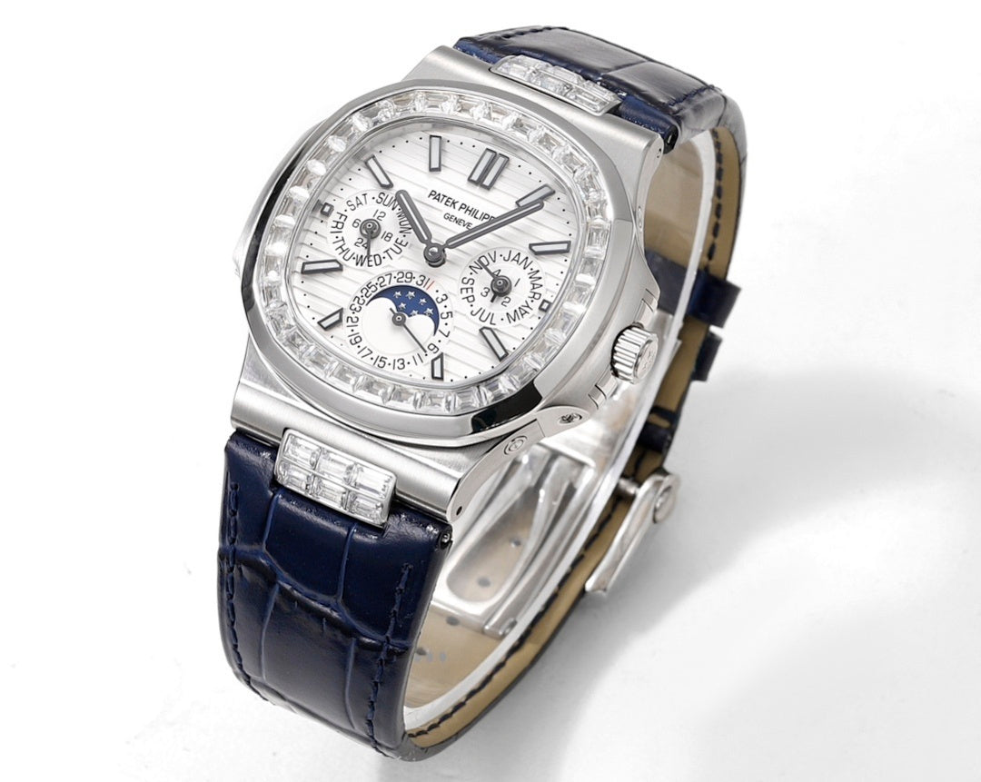 Patek Philippe watch three-quarter view, silver case, blue leather strap, diamond bezel.