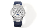 Patek Philippe watch with blue leather strap and silver case, diamond bezel.
