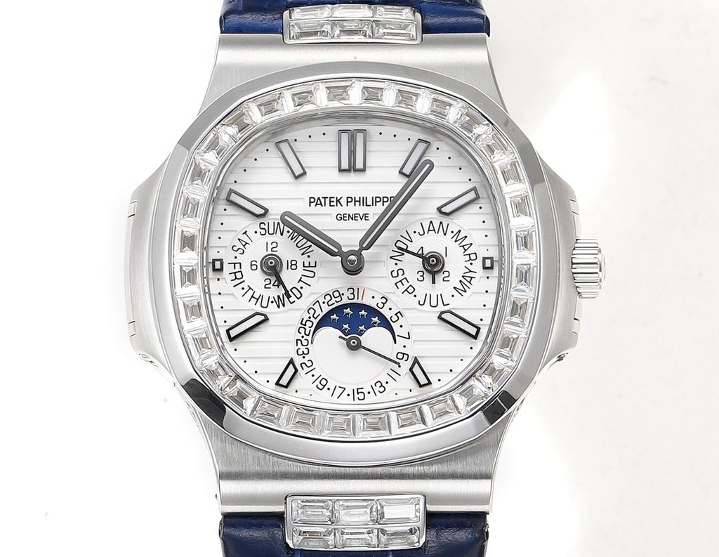 Patek Philippe watch front view with blue strap; silver case, ornate dial and date windows.