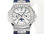 Patek Philippe watch front view with blue strap; silver case, ornate dial and date windows.