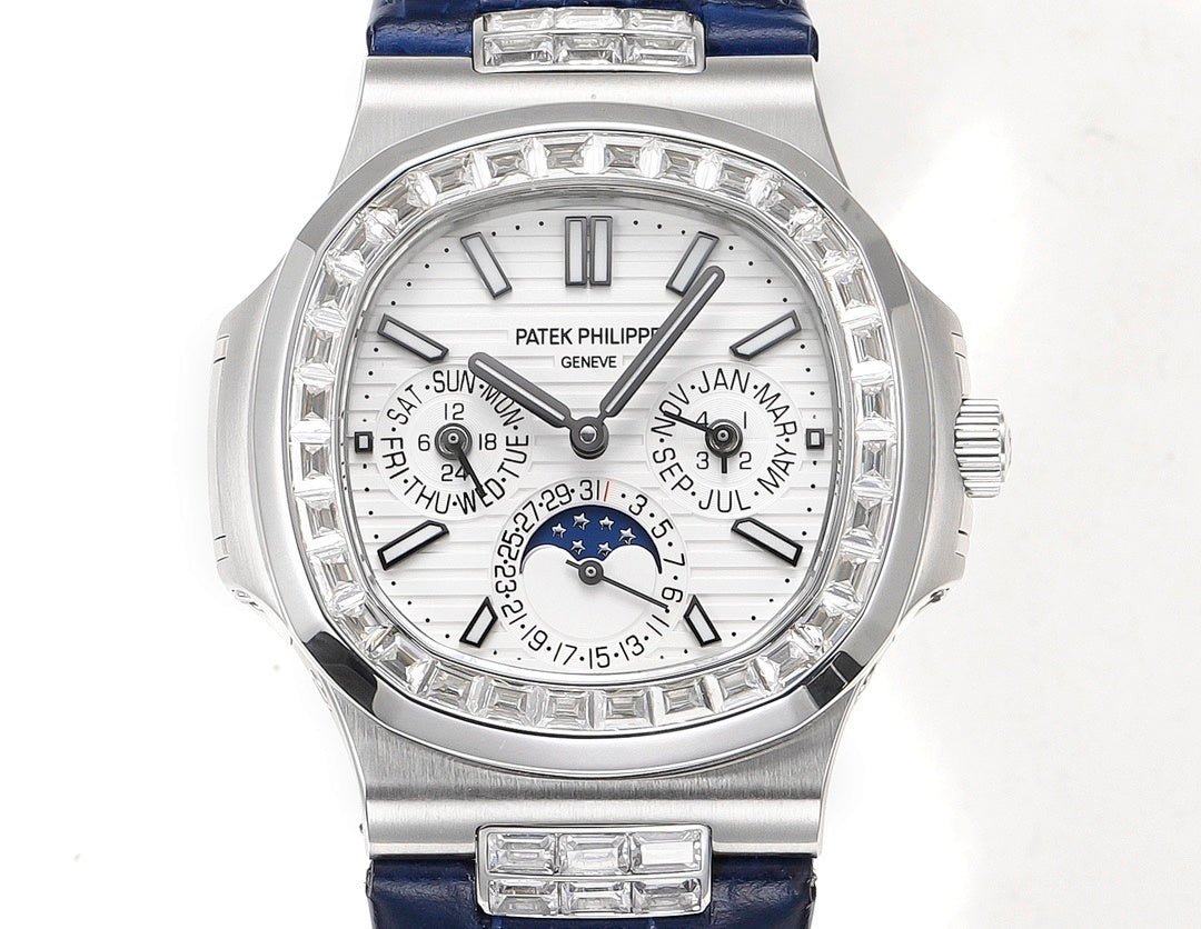 Patek Philippe watch front view with blue strap; silver case, ornate dial and date windows.