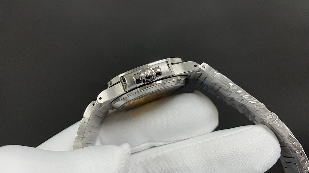 Patek Philippe wristwatch back view with steel bracelet links and clasp area