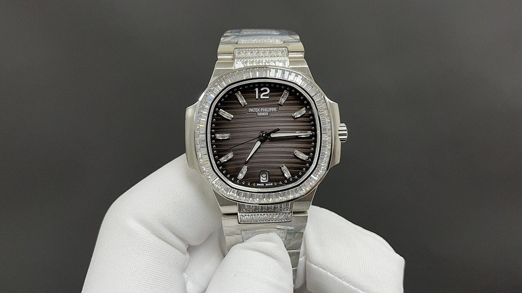 Patek Philippe wristwatch front view with black dial and diamond-set bezel