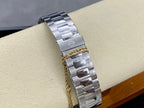 Stainless steel watch bracelet with two-tone gold rope detail across metal links