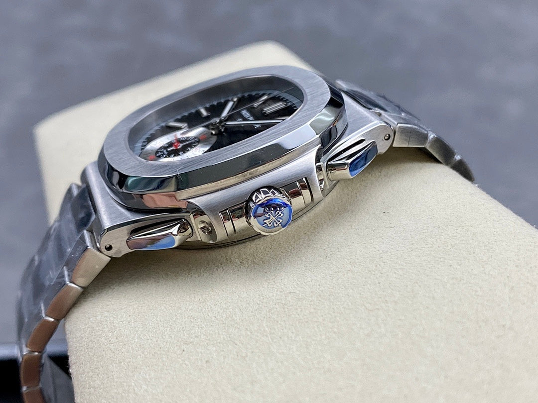 Stainless steel wristwatch with round case, crown detail, and dark dial with subdials