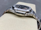 Stainless steel wristwatch with polished caseback and metal bracelet links
