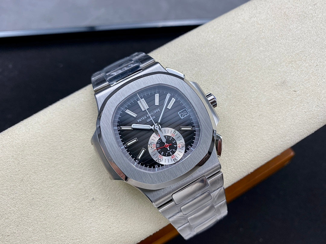 Stainless steel wristwatch with dark dial, subdials, and date window near 3 o'clock