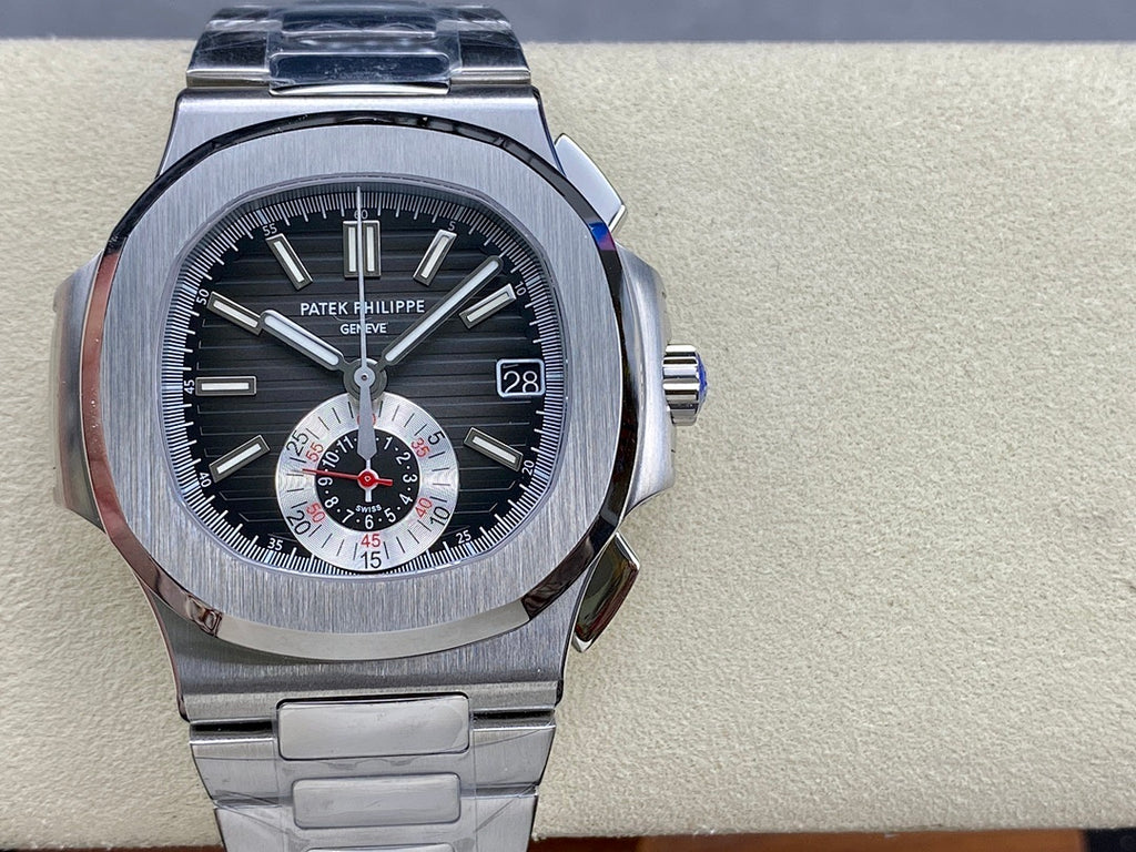 Stainless steel wristwatch with dark blue dial, subdials, and date display at 3 o'clock
