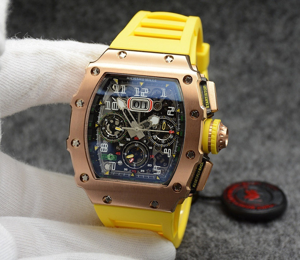 Richard Mille watch with rose gold case, dark dial, and yellow rubber strap