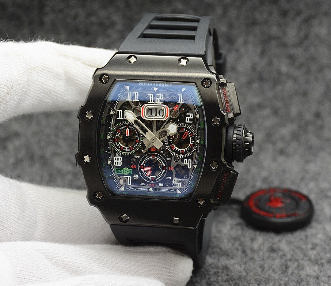 Richard Mille watch with black case, black strap, colorful multi-dial skeleton face