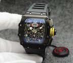 Richard Mille watch with black case, black strap, multi-dial skeleton face with yellow detail