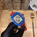 Richard Mille watch with blue case and red strap, openwork skeleton dial