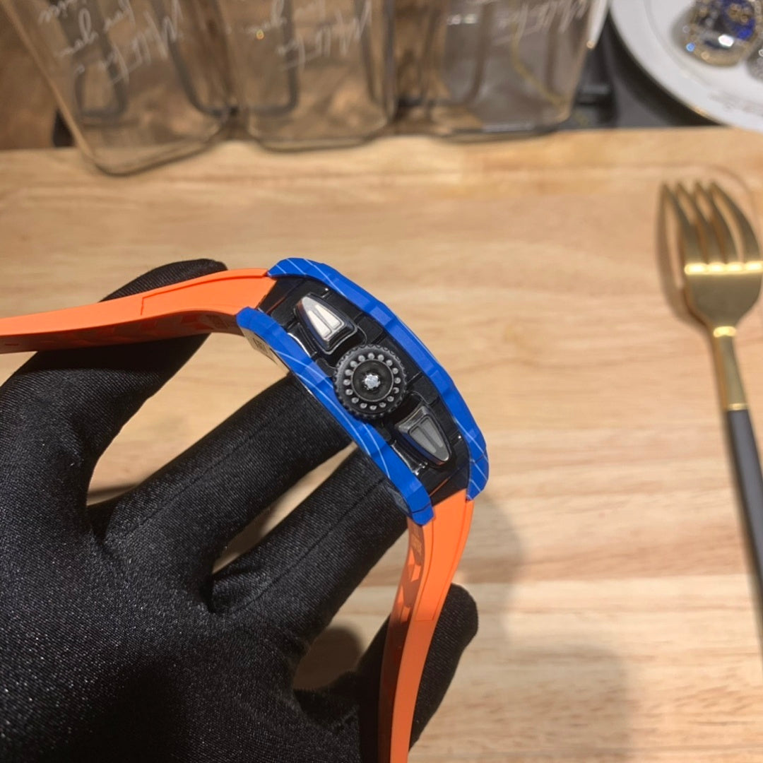 Richard Mille watch side view with blue and orange bezel, textured strap