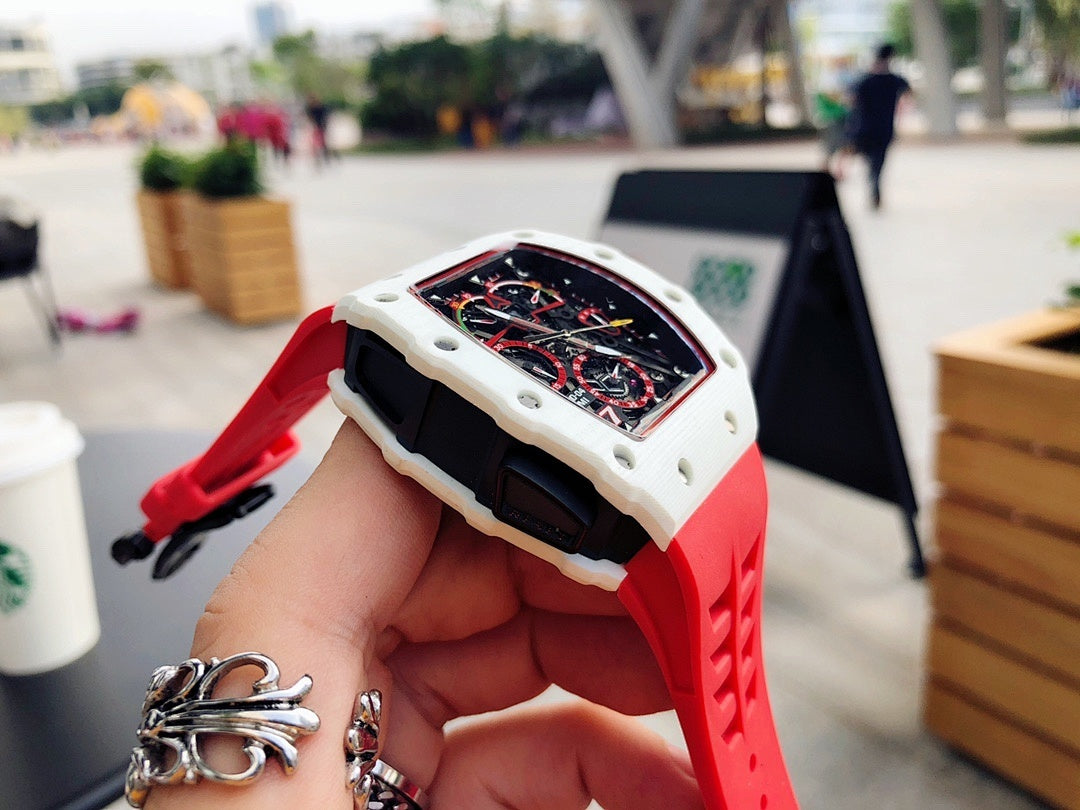 Richard Mille watch close-up, red rubber strap with white case and skeleton dial