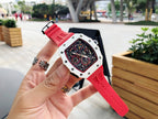 Richard Mille watch on wrist, red rubber strap with white case and skeleton dial