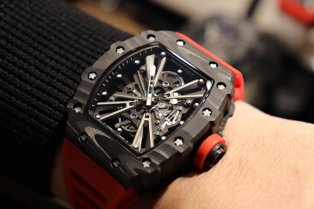 Richard Mille watch close-up with black octagonal case and intricate metal dial