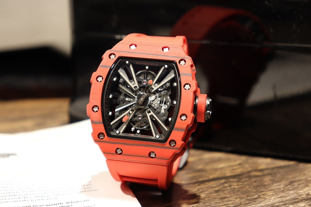 Skeleton sports watch with red silicone strap, black dial, red bezel and crown guards