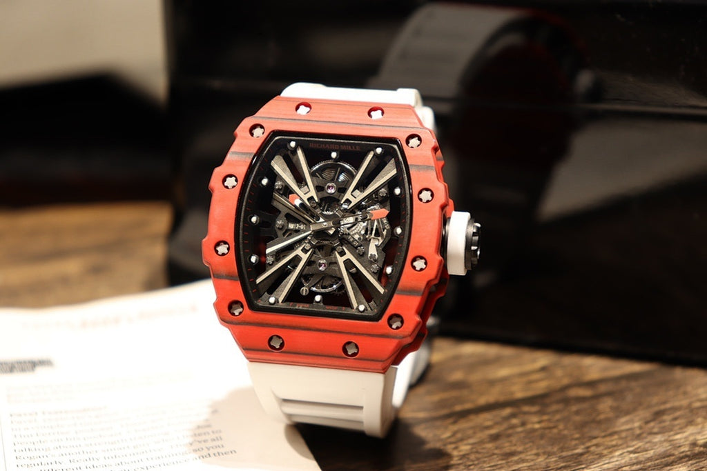 Skeleton sports watch with white silicone strap, red octagonal bezel, black dial