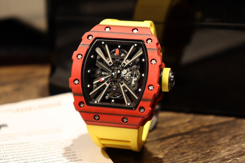 Skeleton sports watch with yellow silicone strap, red octagonal case, black dial