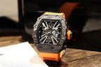 Richard Mille skeleton sports watch with orange silicone strap, black dial and angled profile