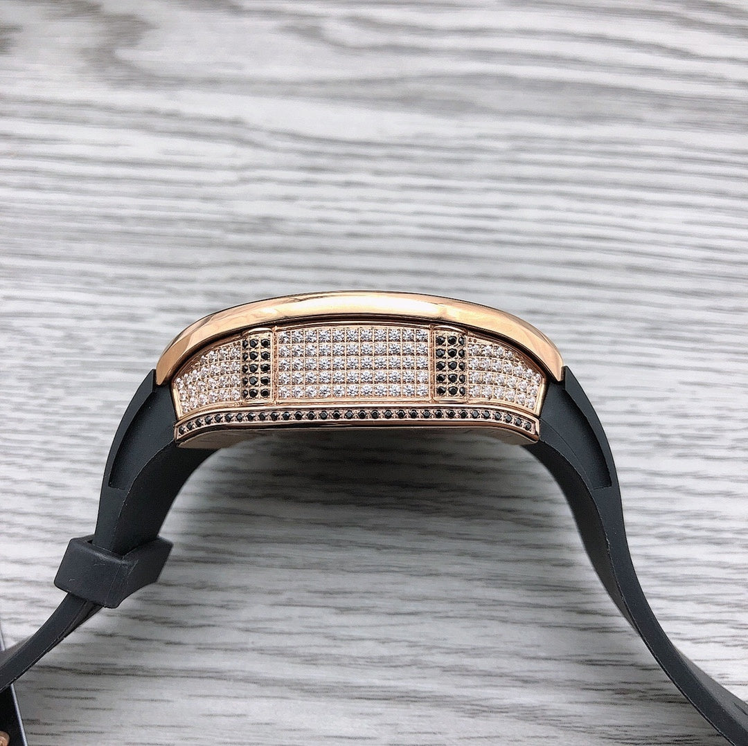 Richard Mille watch top view, rose-gold diamond bezel, black rubber strap