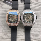 Two Richard Mille watches with diamond bezels: rose-gold and silver, black rubber straps