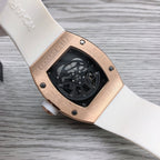 Richard Mille watch caseback on white rubber strap with black dial panel.