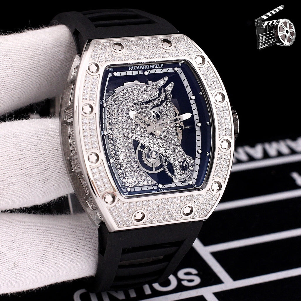 Richard Mille watch with diamond-set tonneau case, black rubber strap, blue skeleton dial