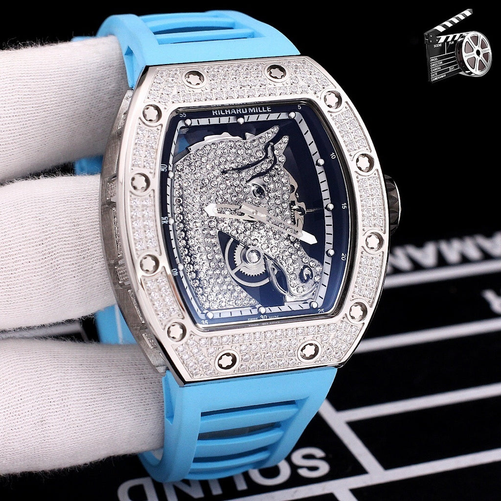 Richard Mille watch with diamond-set tonneau case, light blue rubber strap, blue skeleton dial