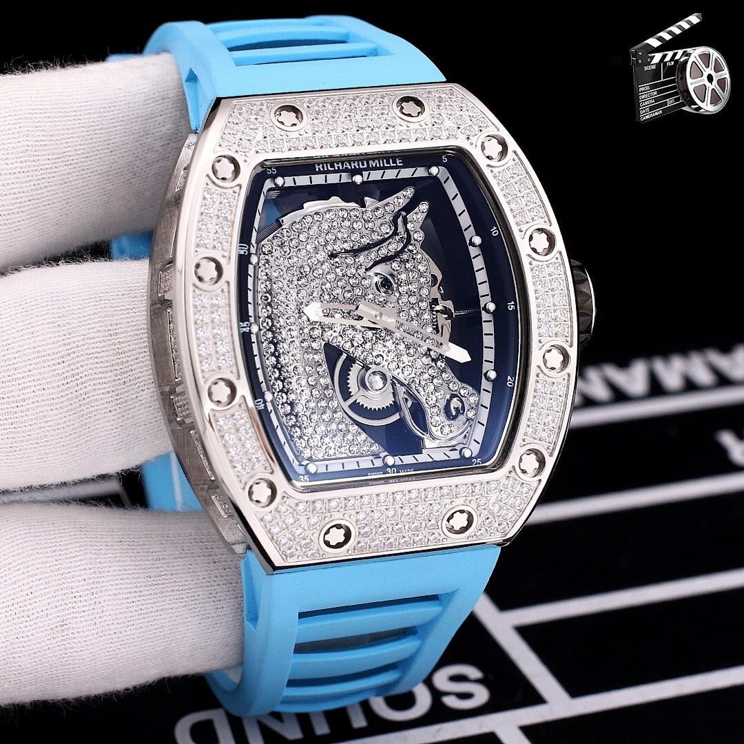 Richard Mille watch with diamond-set tonneau case, light blue rubber strap, blue skeleton dial
