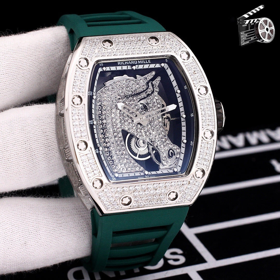 Richard Mille watch with diamond-set tonneau case, dark green rubber strap, blue skeleton dial
