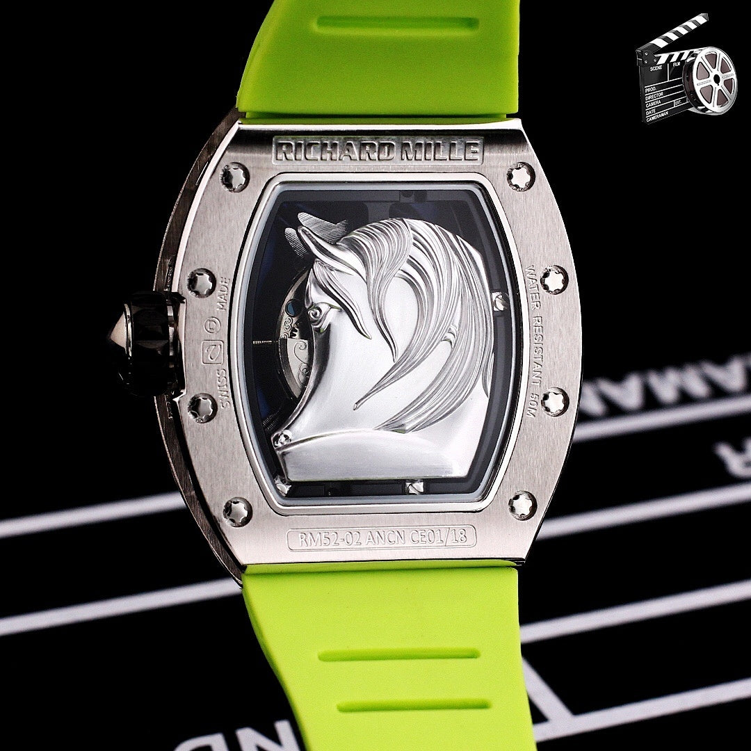Richard Mille watch with white dial artwork, green rubber strap, brushed silver case