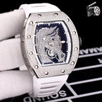 Richard Mille watch with diamond-set case, white rubber strap, blue skeleton dial view